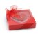 Vela con forma de corazón en soporte de cristal roja con logo