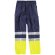 Pantalón bicolor, con dos cintas de alta visibilidad y cintura elástica marino/amarillo a.v.